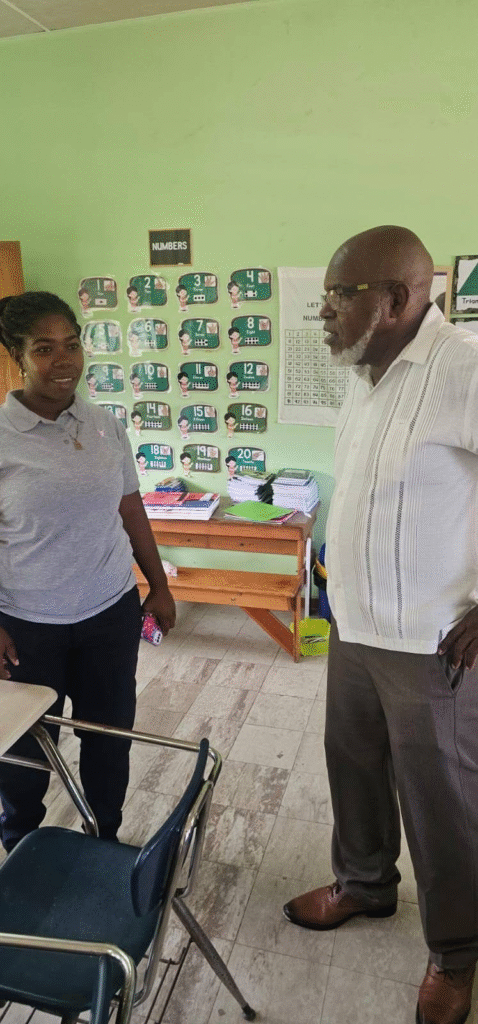 Minister Usher greeting students