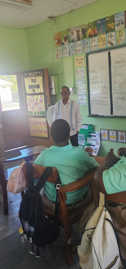 Minister Bernard greeting students