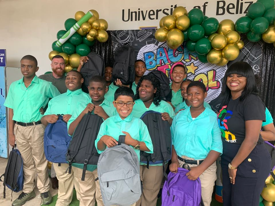 Group photo with donated items